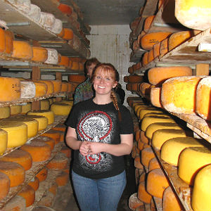 student engage in Tropical Ecology course in at a cheese factory in Costa Rica