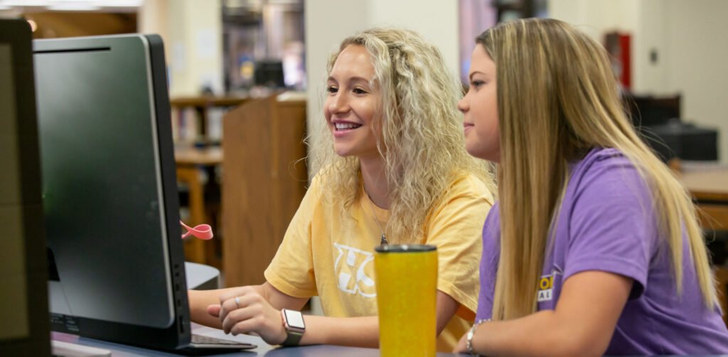 Information Science student in computer lab