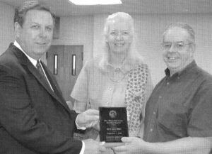 Dr. Lanny Hall presenting Bill and Janis Altom the first Altom Award in 2001.