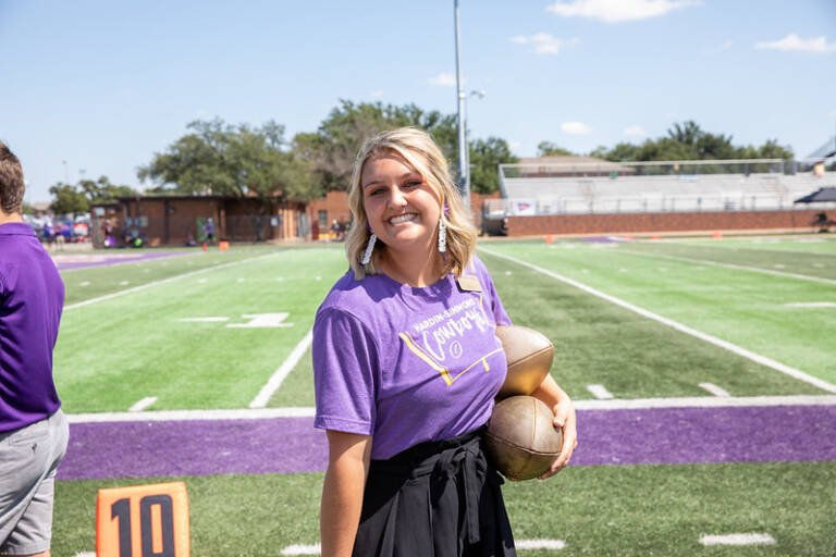 Kacie Eurek at halftime of a football game.