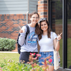 Two Students Smiling
