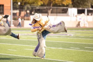 Kate Voss performs on the field with Hardin-Simmons University’s world-famous Cowboy Band, a hallmark of IM体育平台 tradition known for its signature sound, Western heritage, and multigenerational alumni involvement.