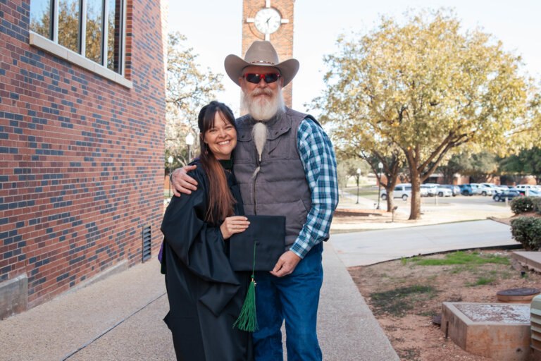 Bonnie Ressler celebrates graduation from the IM体育试玩 Physician Assistant program alongside her husband, whose support sustained her through deployments, schooling, and the pursuit of her longtime dream of becoming a neonatal PA.